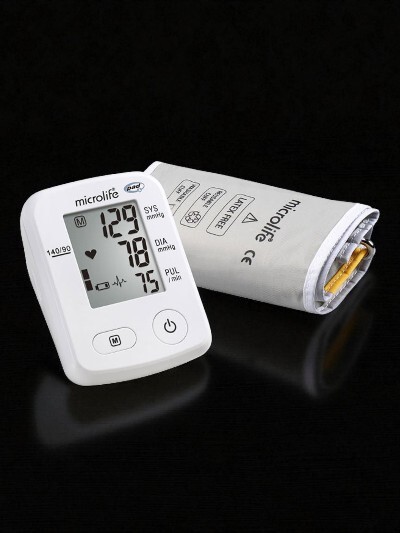 Digital Microlife blood pressure monitor on wooden desk &ndash; thoughtful Father&rsquo;s Day health gift in Nepal